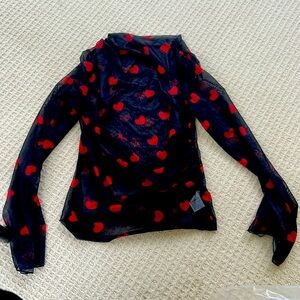 Long sleeved mesh mock turtleneck runched blouse